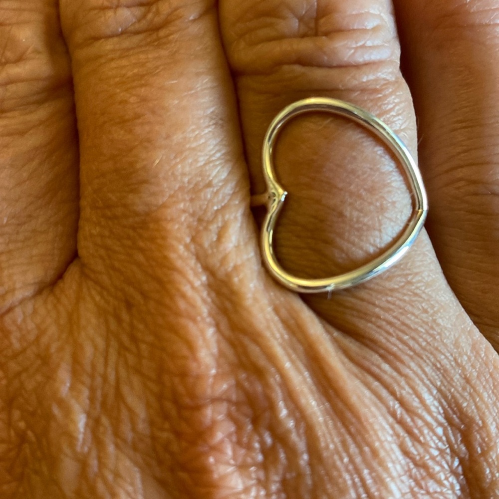 Sterling silver open heart ring. Size 9. Simple but stunning.
